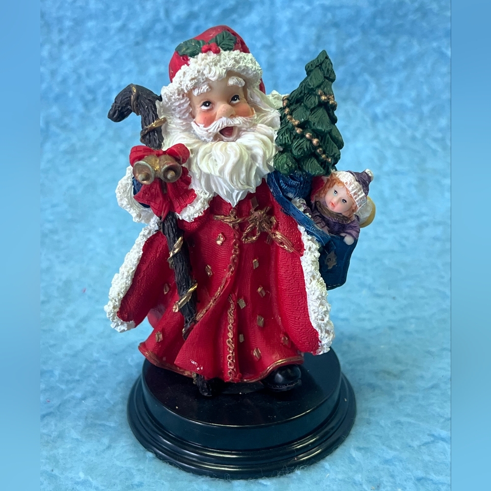 Festive Santa Claus Figurine in Red and Gold